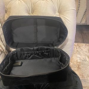 Deep black velvet YSL toiletrie bag